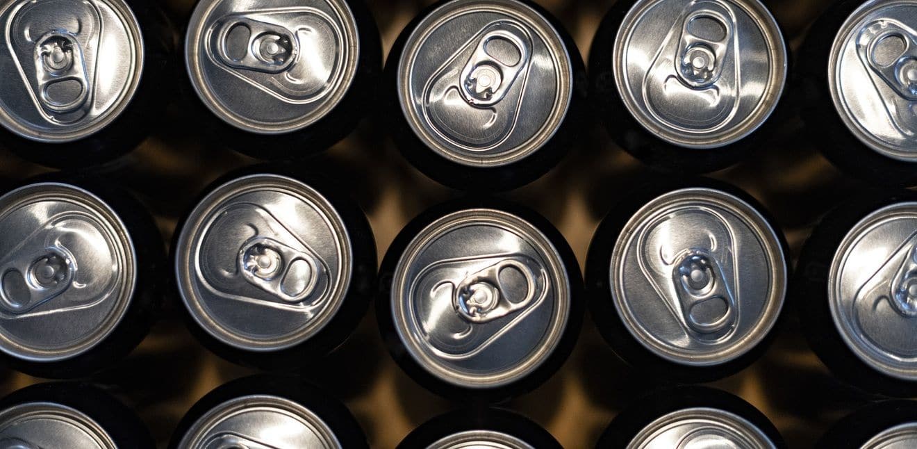 Close-up of aluminium beverage can tops